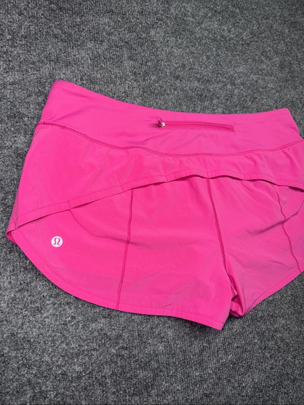 Lululemon Speed Up Shorts in the bright Sonic Pink colorway
